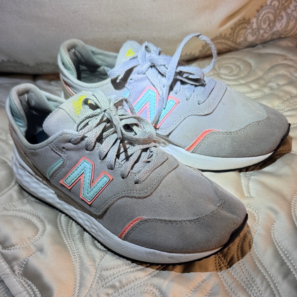 New Balance Gray Sneakers with Pink and Yellow Highlights‎